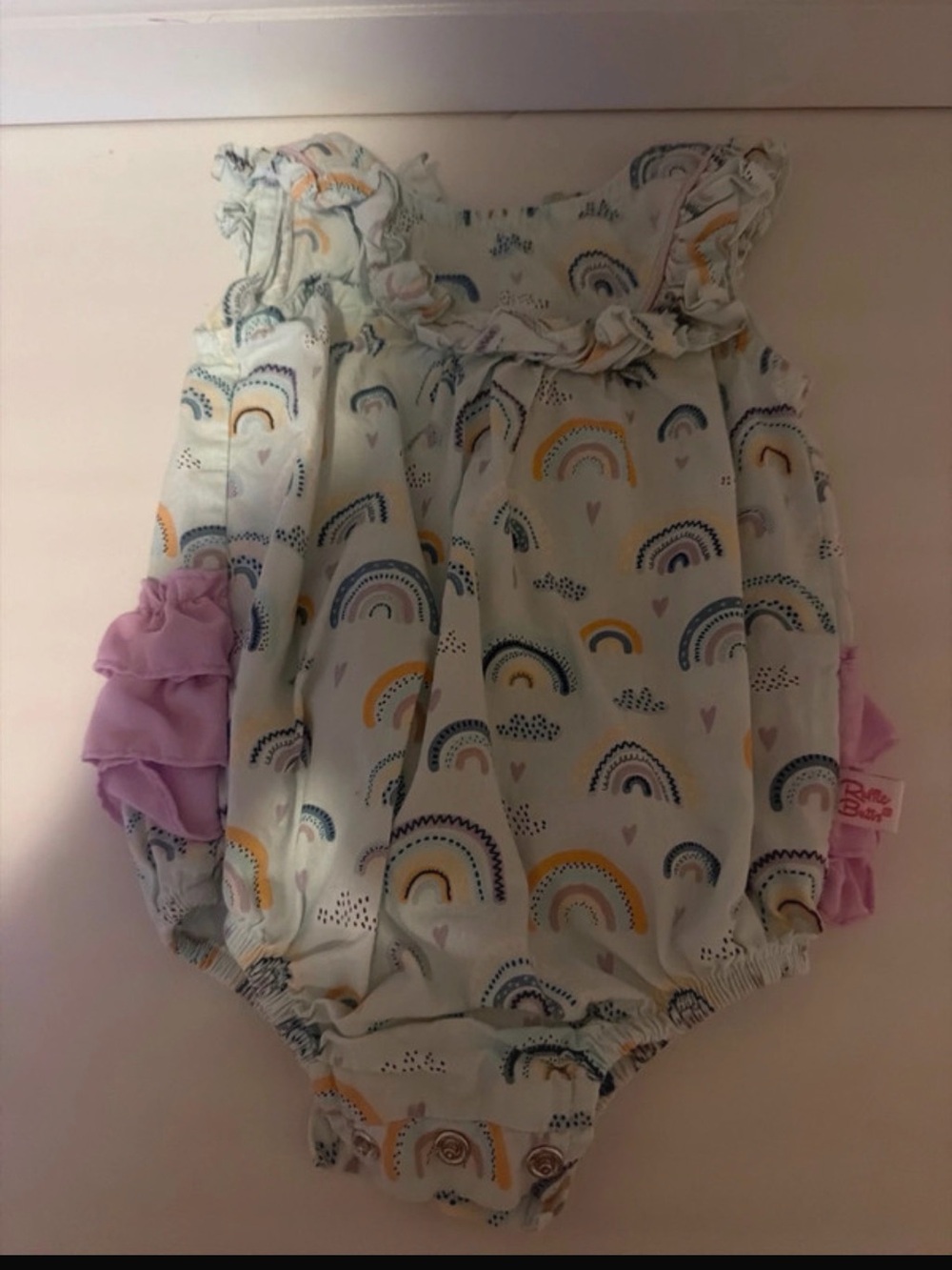 Ruffle Butts Rainbow Print One-Piece with Pink Ruffles